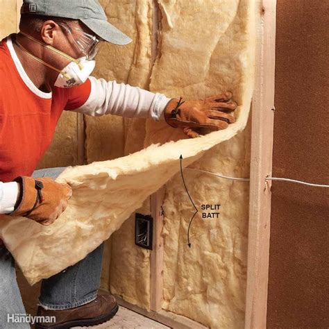 installing insulation around electrical boxes|installing insulation batts in walls.